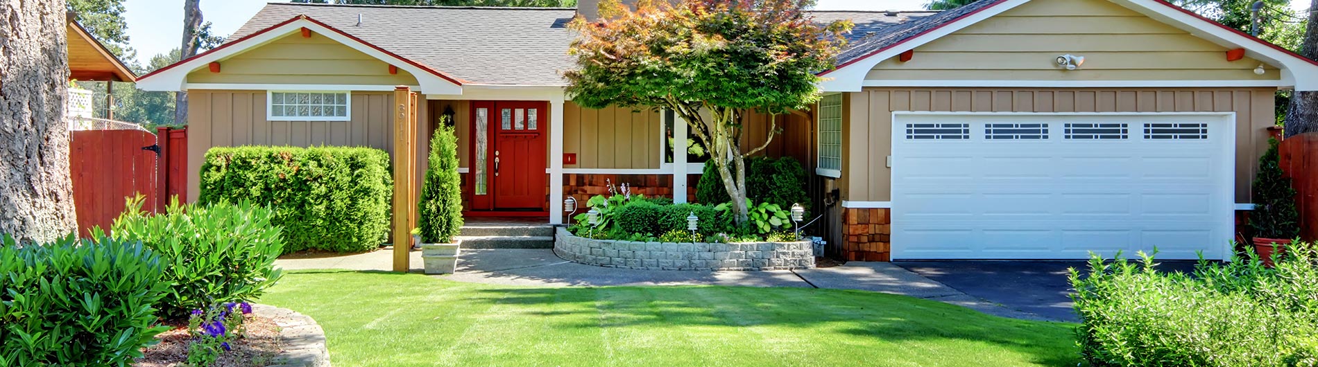 Home with beautiful landscaping