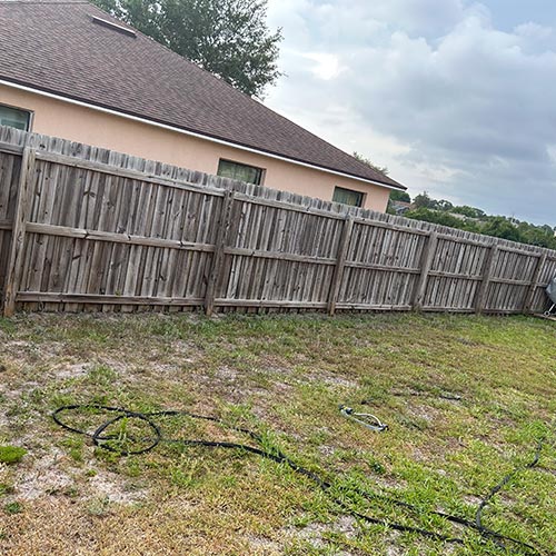 Brevard fence pressure washing photo. Before & after