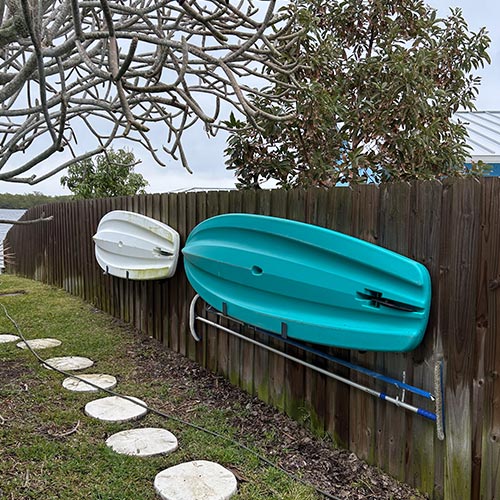 Cocoa fence pressure washing photo. Before & after