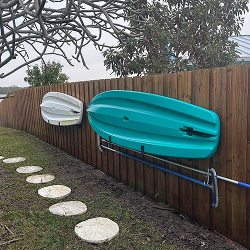 Cocoa fence pressure washing photo. Before & after